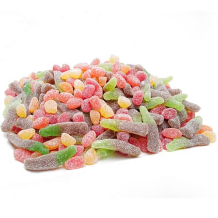Fruchtgummi-Mischung, oval, blau, orange, grün und rot, in einer transparenten Plastiktüte.